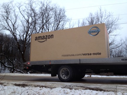 Nissan Versa gets delivered in a massive Amazon box.